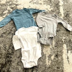 Carter’s 6 months body suits